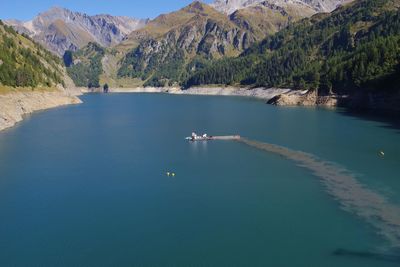 Scenic view of lake by mountains