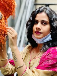 Portrait of young woman doing ritual 