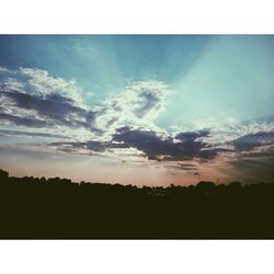 Scenic view of landscape against sky during sunset