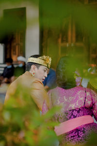 Portrait of young woman in traditional clothing