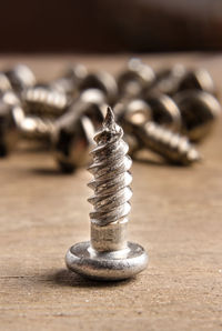 Close-up of rusty metal on table