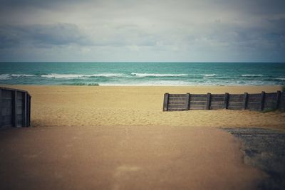 Scenic view of beach against sky