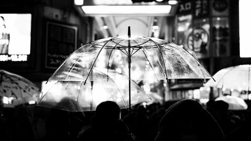 People on street in rain