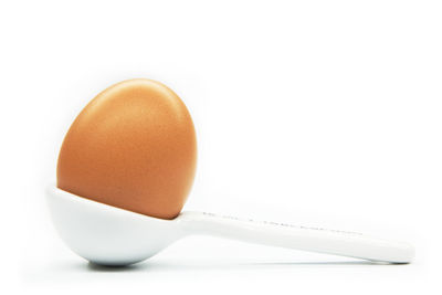 Close-up of breakfast against white background