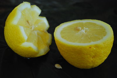 Close-up of lemon slice on table