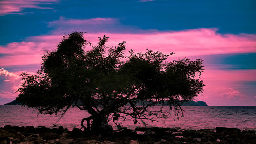 Scenic view of calm lake against sky