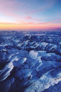 Aerial view of landscape with mountains in background