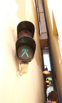 Low angle view of illuminated light against building