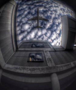 Low angle view of building against cloudy sky