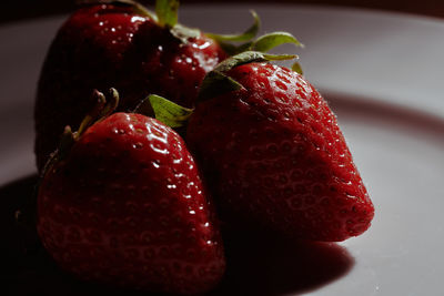 Close-up of strawberries on table