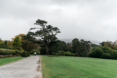 Scenic view of golf course against sky