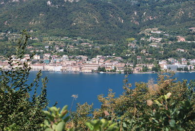 High angle view of townscape by sea