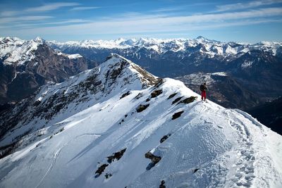 Scenic view of snowcapped mountain against sky