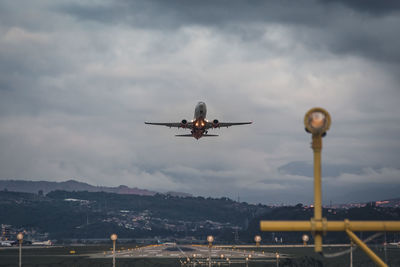 Airplane flying in sky