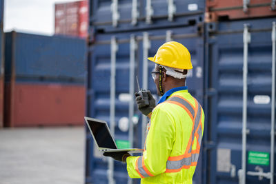 Man working on mobile phone