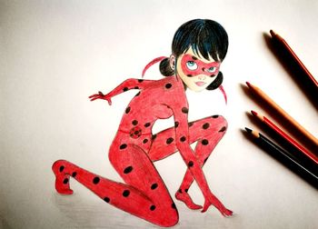 High angle portrait of girl with red umbrella