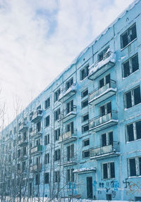 Low angle view of modern building against sky