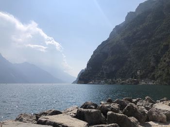 Scenic view of sea and rocks against sky