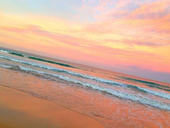 Scenic view of sea at sunset