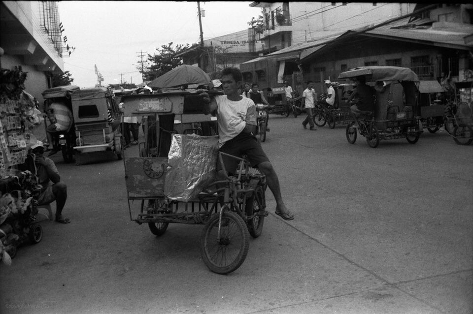 transportation, land vehicle, mode of transport, bicycle, building exterior, street, architecture, stationary, built structure, parking, parked, car, motorcycle, road, city, day, outdoors, travel, incidental people