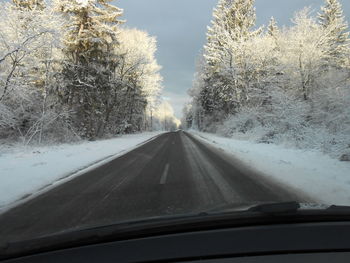 Road seen through car windshield