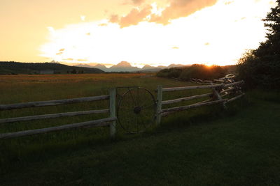 Scenic view of landscape at sunset