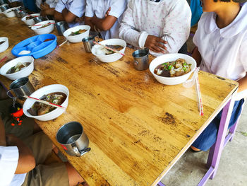 High angle view of people having food