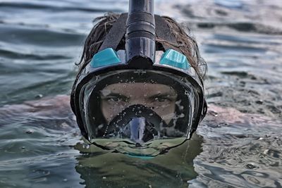 Close-up of swimming in sea