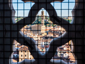 Buildings seen through glass window