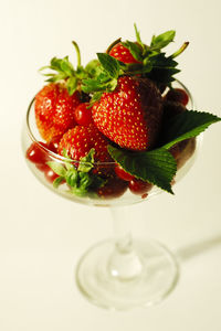 Close-up of strawberries on glass table