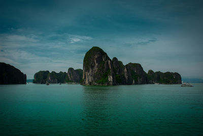 Scenic view of bay against sky