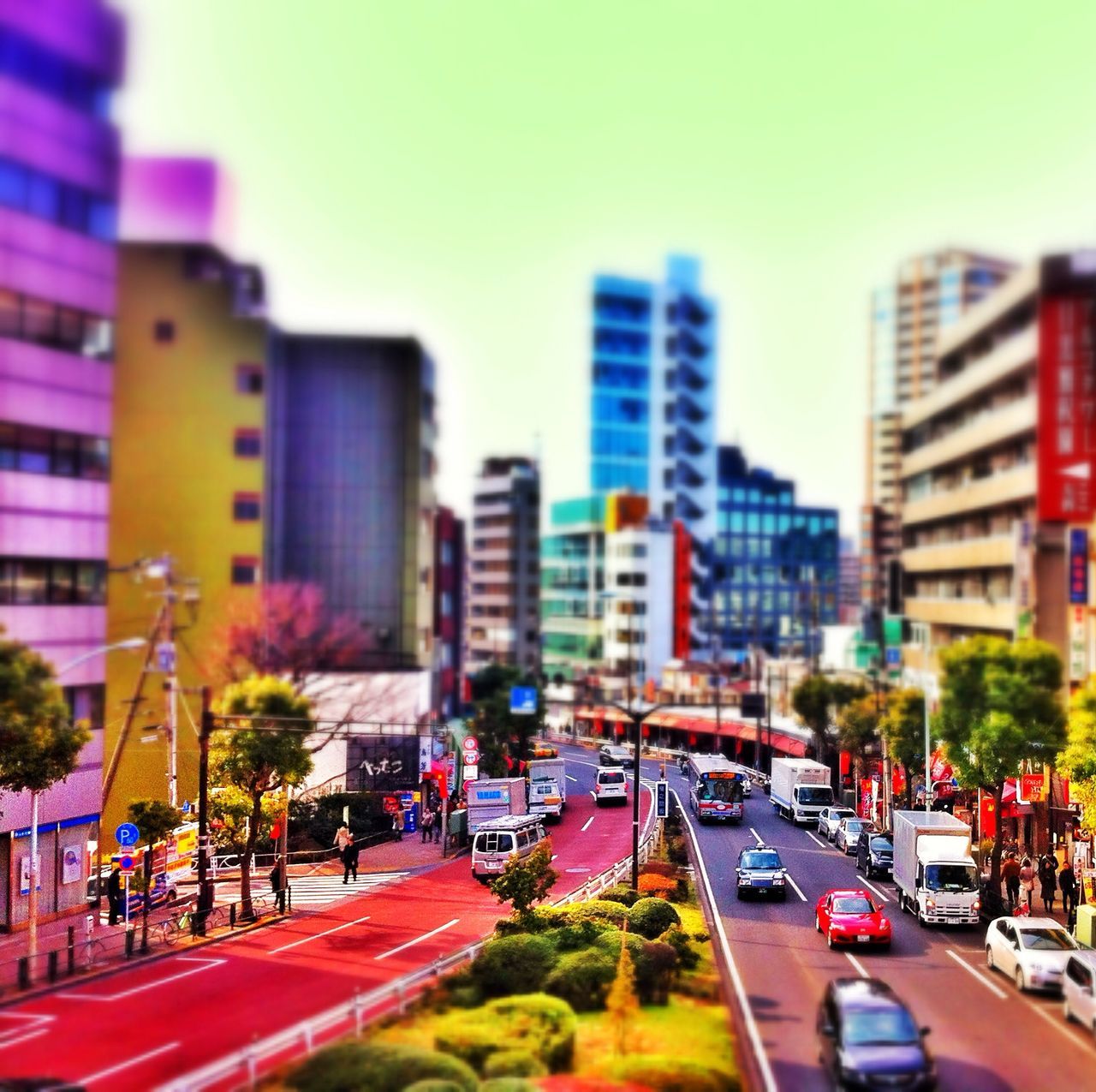 transportation, car, building exterior, architecture, city, land vehicle, built structure, street, road, mode of transport, traffic, clear sky, city street, city life, road marking, on the move, building, incidental people, sky, vehicle