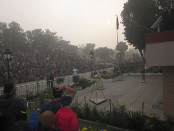 People at town square against sky