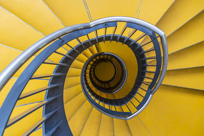 Directly above shot of spiral staircase in building