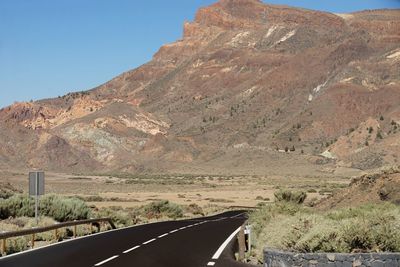 Road leading towards mountains
