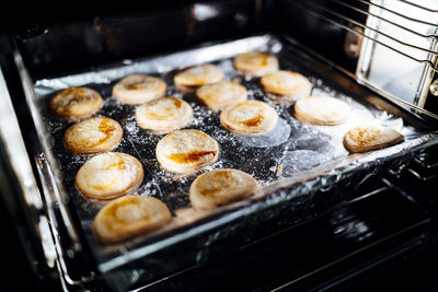 High angle view of cookies on baking sheet