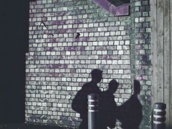 Shadow of couple on wall