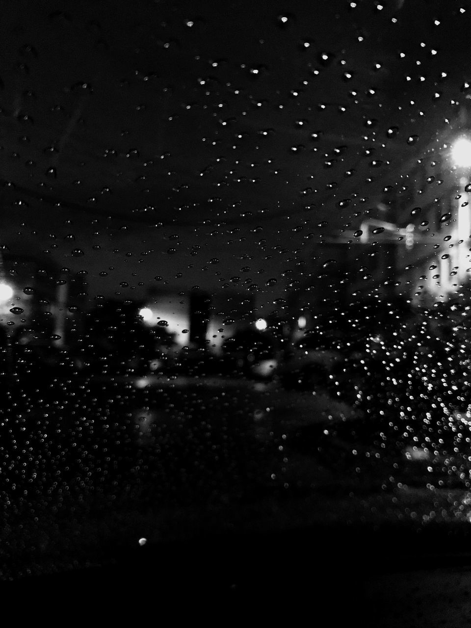 WET GLASS WINDOW IN CITY