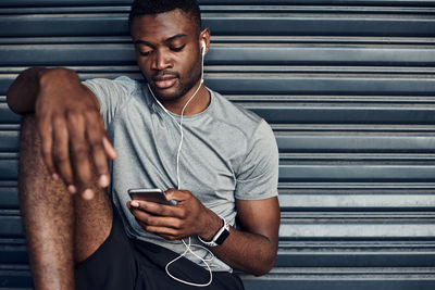 Young man using mobile phone