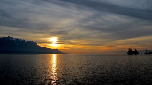 Scenic view of sea against sky during sunset