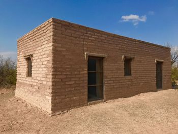 Exterior of historic building against clear sky