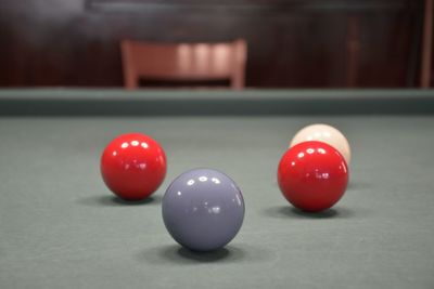 Close-up of red ball on table