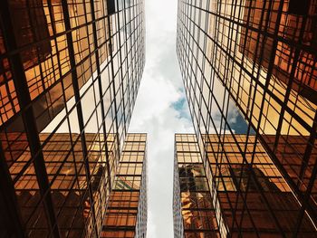 Low angle view of modern buildings against sky