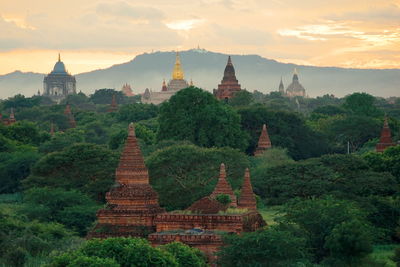 Temple against sky during sunset