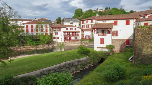 Houses and buildings against sky