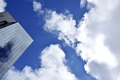 Low angle view of modern office building against sky