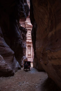 People walking in cave