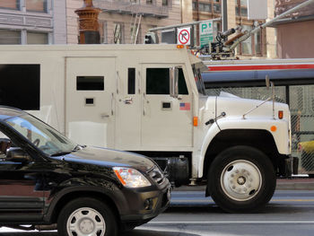 View of cars parked on road