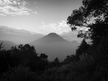 Scenic view of mountains against sky during sunset