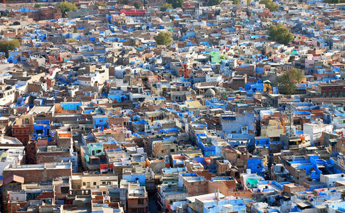 High angle view of buildings on sunny day in city